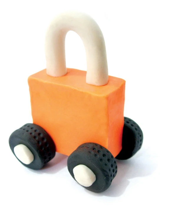 a small toy toy with a white handle