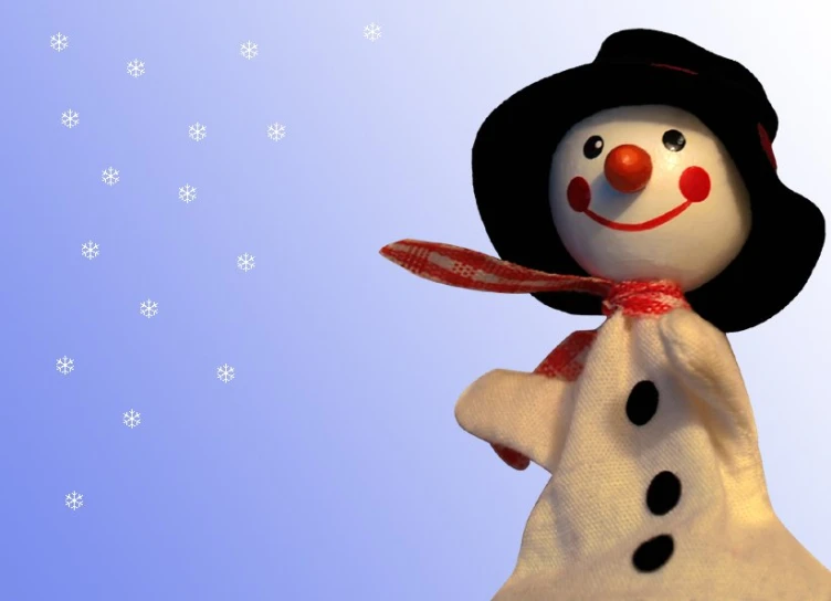 a snowman with a long neck and black hat