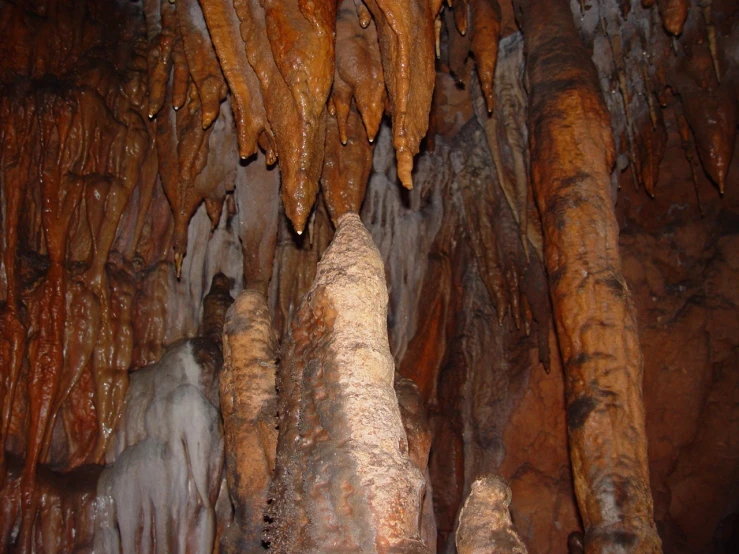 many ice formations in an interior with clear water