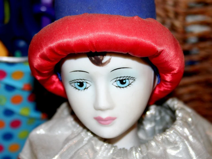 doll wearing bright pink hair and blue eyes