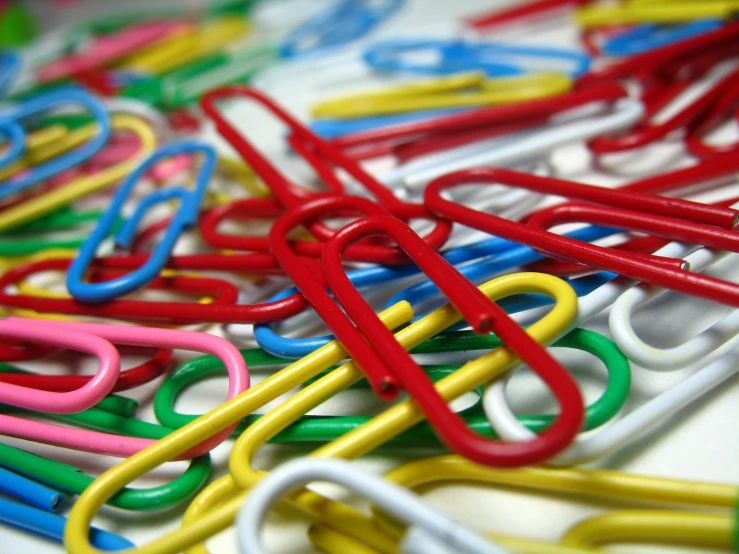 colorful paper clips laid on top of each other