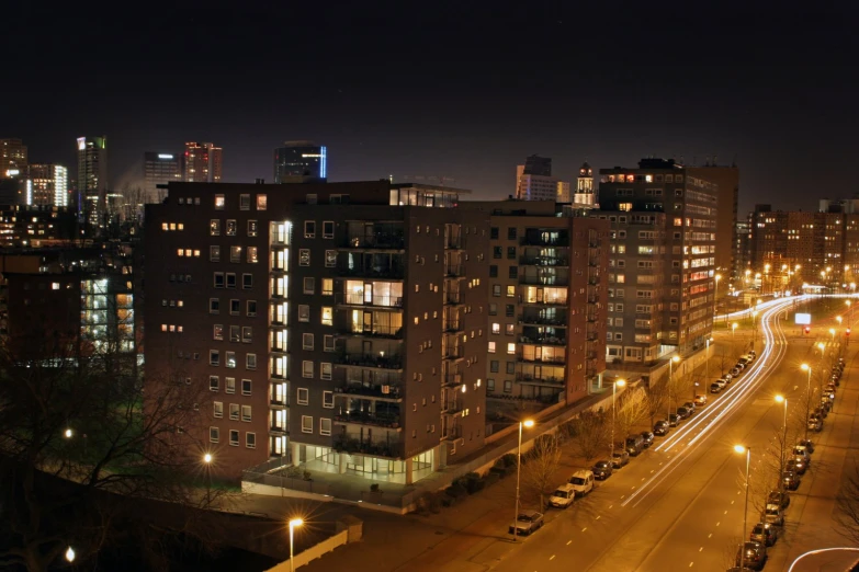 night city view of street lights and a city road