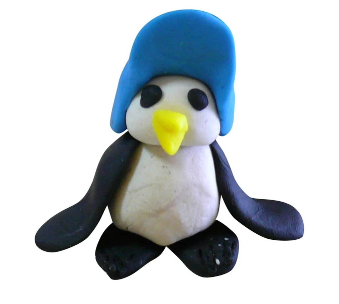 a penguin with a blue cap is wearing black pants and socks