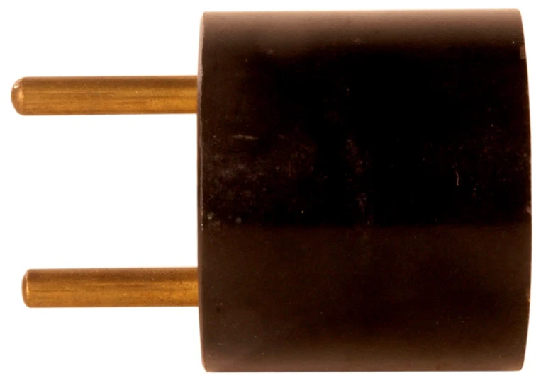 a brown double outleted electrical device plug