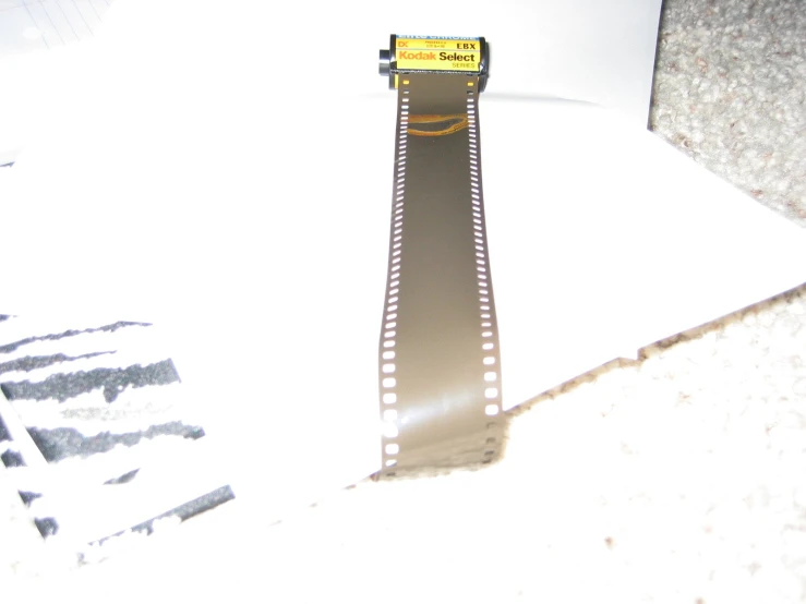 a movie roller sits on a piece of paper
