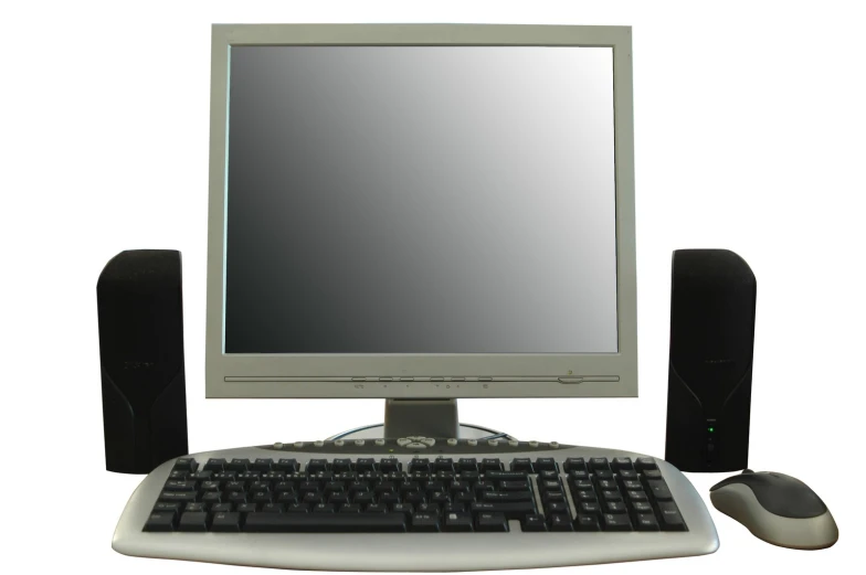 a keyboard and monitor sitting on top of a desk