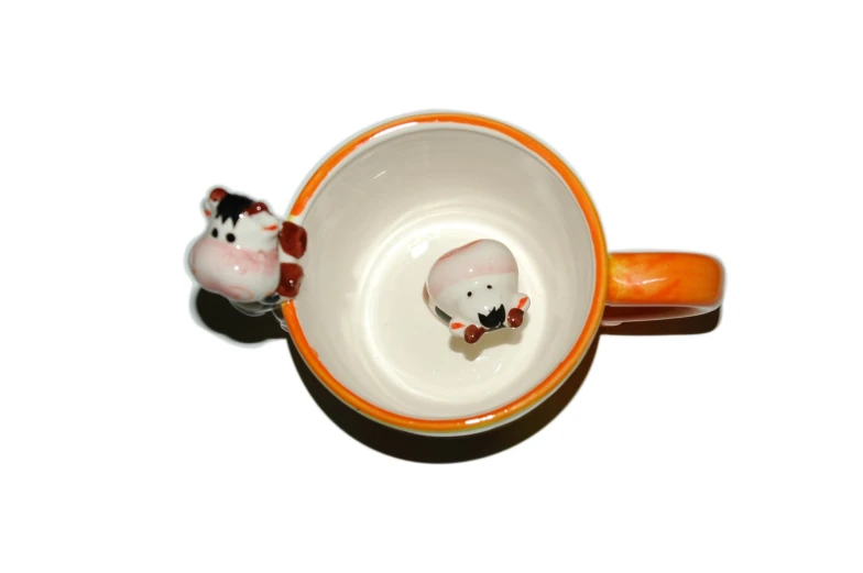 a small white cat bowl with an orange rim and a small kitten bowl