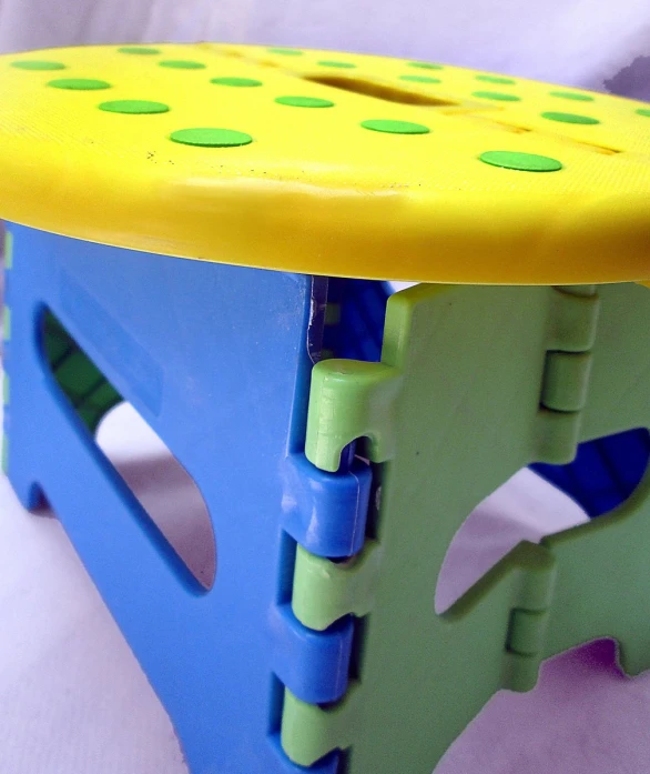 the small children's step stool has bright colors