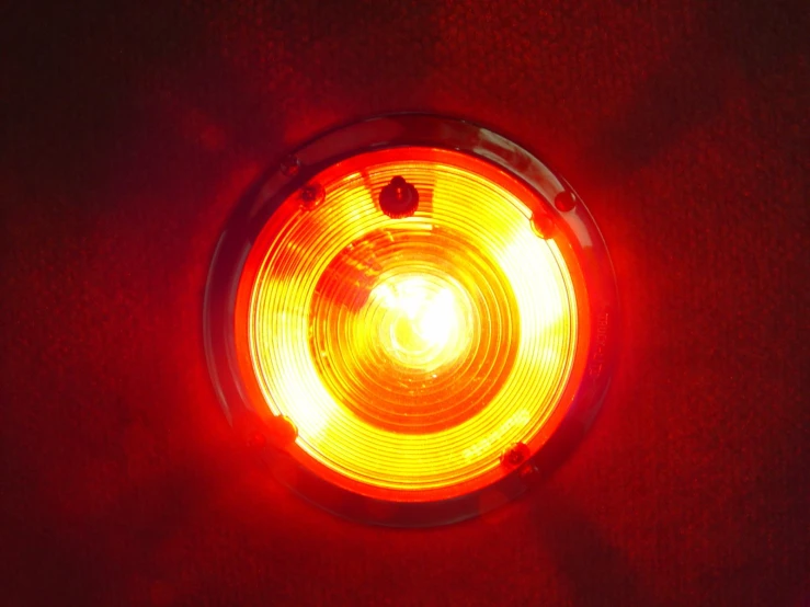 the back view of a bicycle light that is red