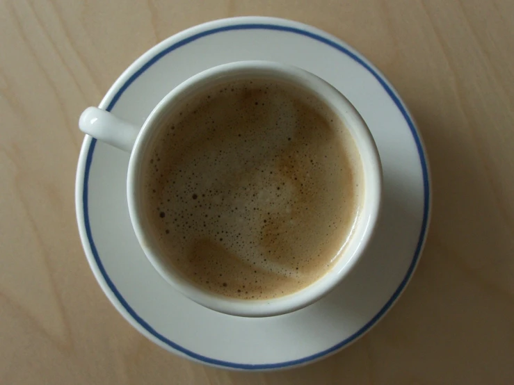 an espresso in a coffee mug on a table
