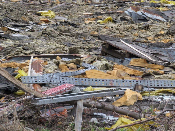 a pile of rubble that has fallen apart and pieces missing