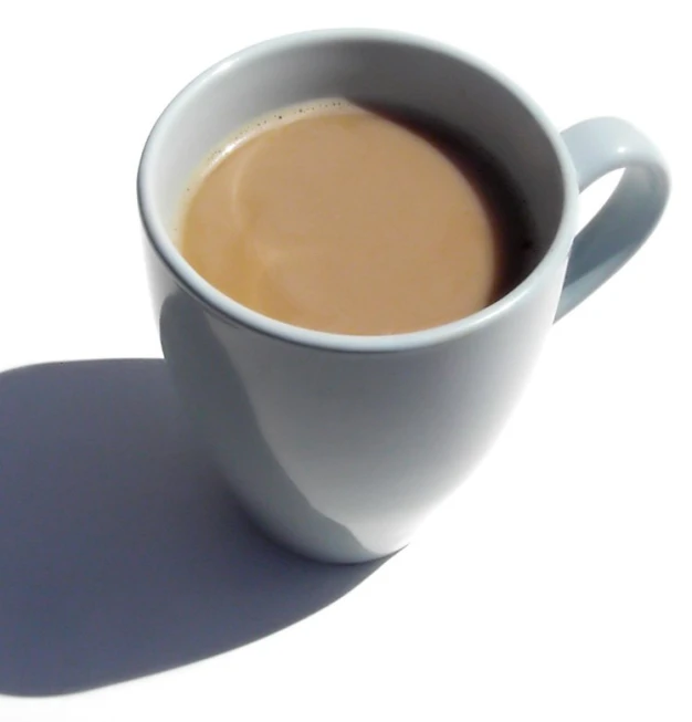 a cup is shown with some liquid in it