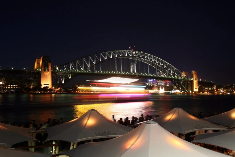 the light show is on in sydney and the water is very quiet