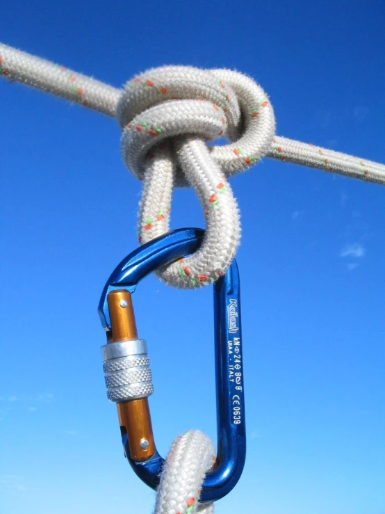 the ropes hang from the structure with one knot tied