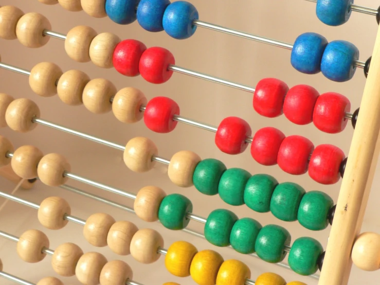 a colorful abanacc sits on a tan background