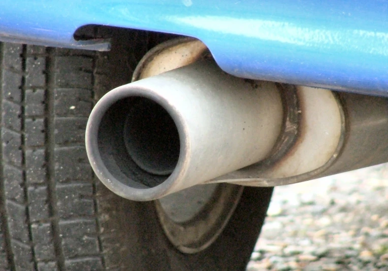 the exhaust pipe on the car's back tire is slightly exposed