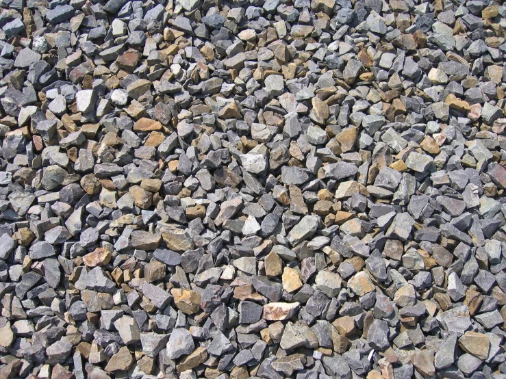 there is a small pile of stones and rocks next to each other