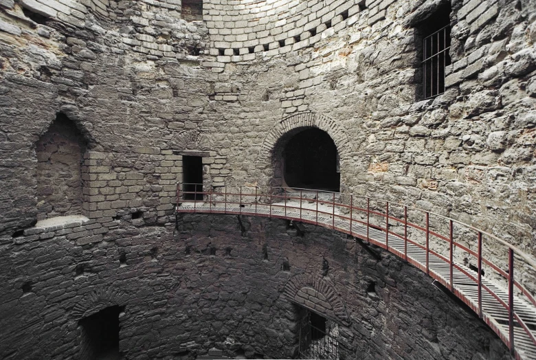 this is a tower with stairs leading up to the doors