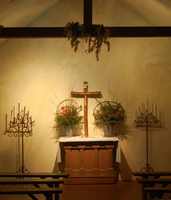 a small altar and alter with hanging flowers