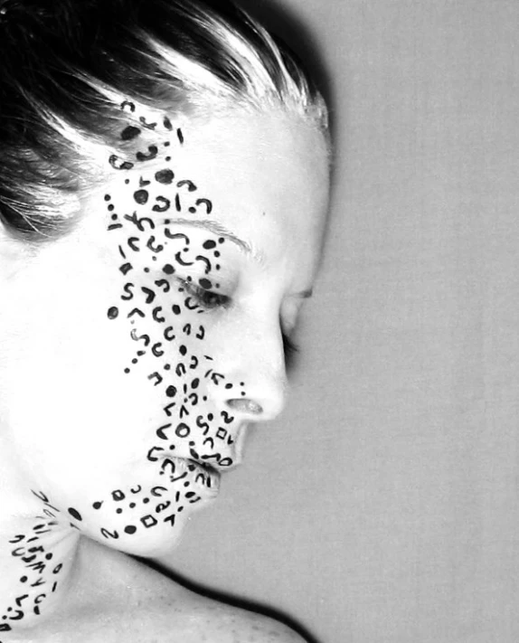 a woman with some leopard prints on her face