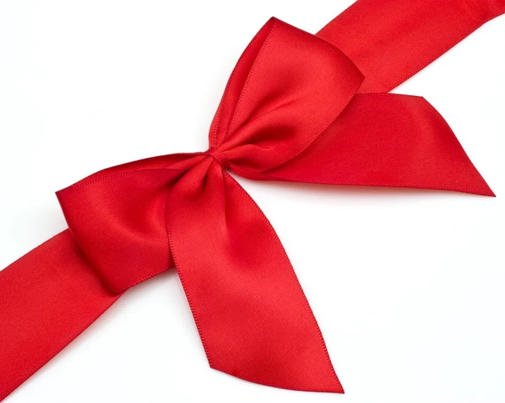 a red ribbon is tied together with the ends of it