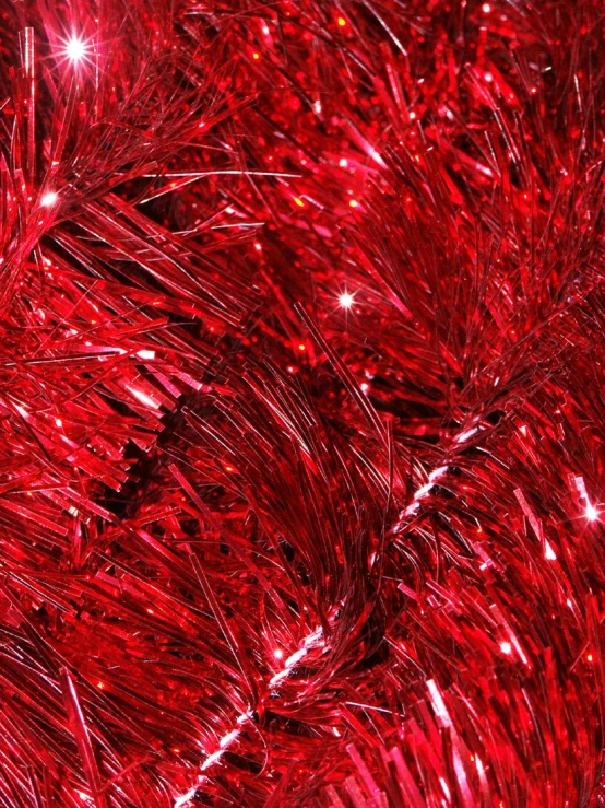 close up of a close up of shiny red tinsel