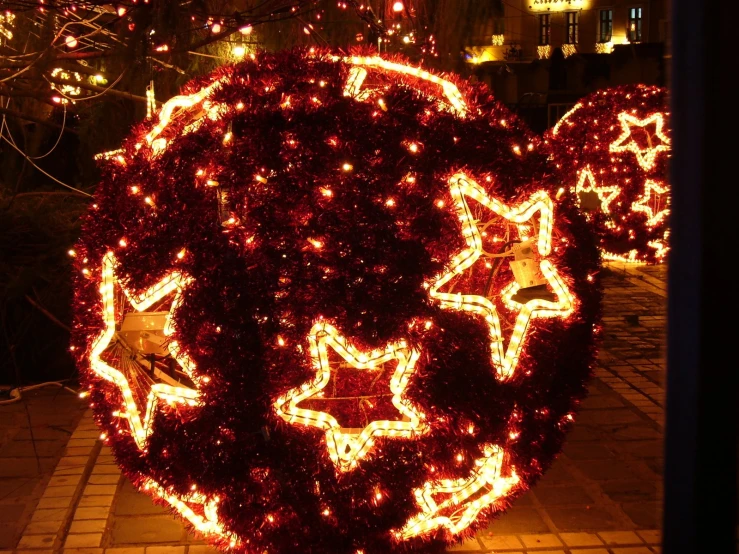 a large ball that is decorated with small lights