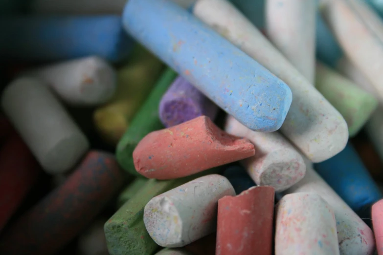 colored pencils lined up in one pile