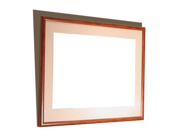 a mirror on a wall with a brown frame