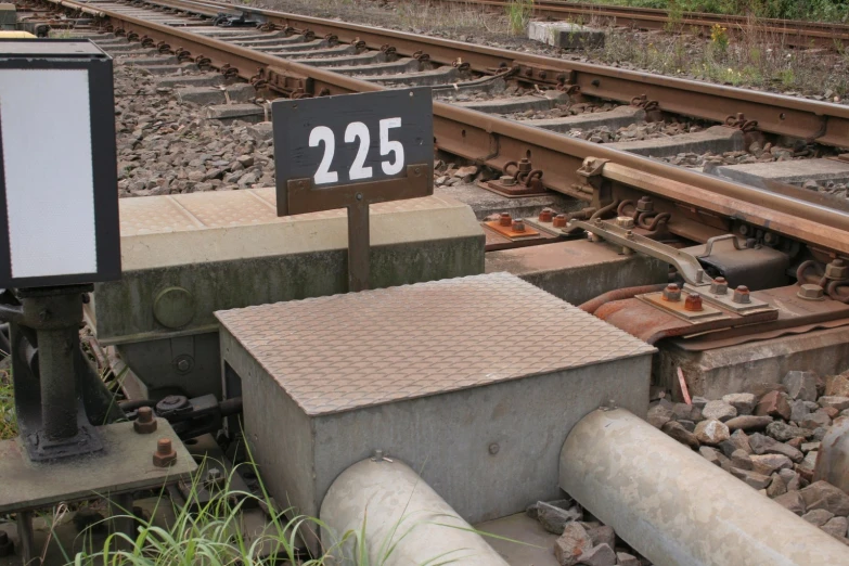 the tracks and rails of a train that have been set up with numbers