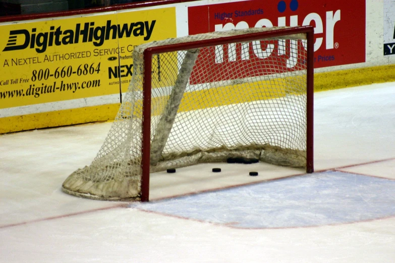 the goalie net has just hit the ball on it