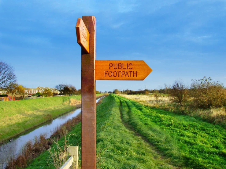 there are two signs next to the path