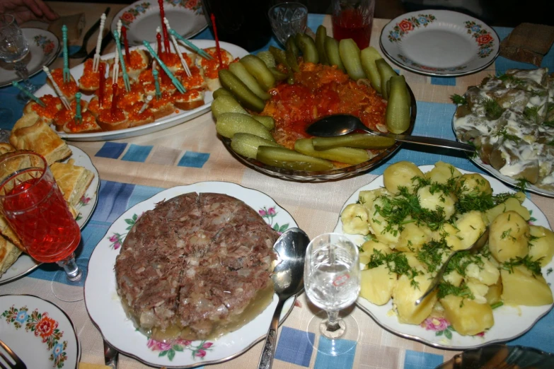 the table is set with different foods and drinks