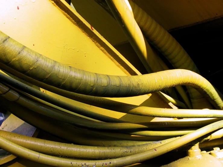 the yellow pipes are tangled up and ready to be installed