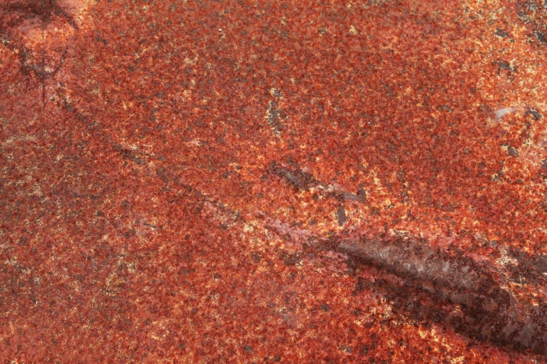 a close up view of some rusted metal