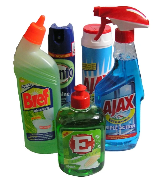 cleaning products displayed together with bottle and container