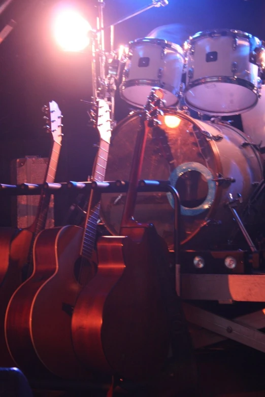 an array of guitars in a recording studio