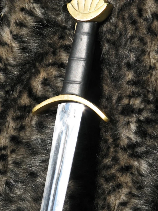 the metal object is resting on top of fur