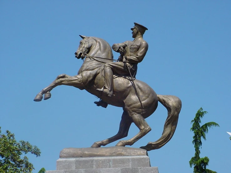 a large statue of a soldier on a horse