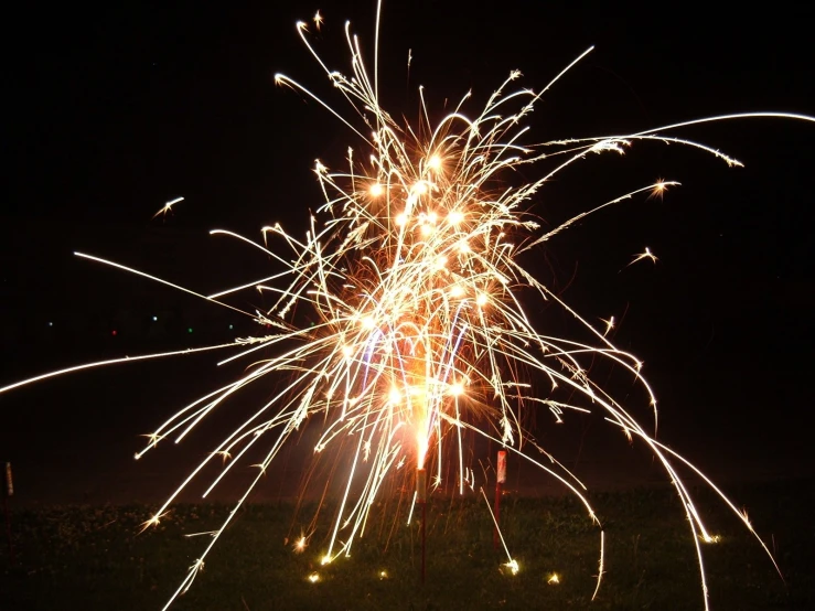 fireworks explodes in the night sky as it looks like it is over