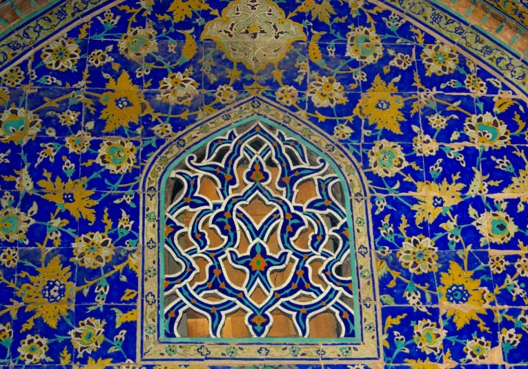 intricately designed blue and gold tile design in tajweed
