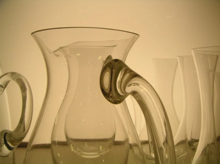 a clear vase that is sitting on a table