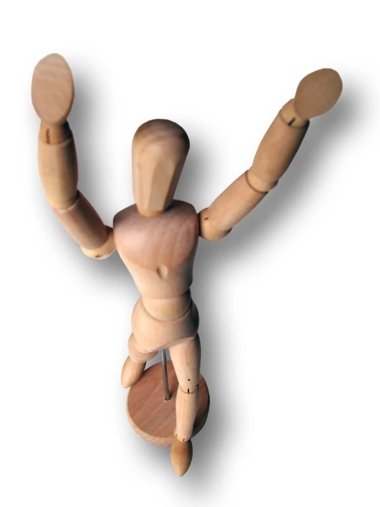 a wooden doll with a wood leg and wooden body