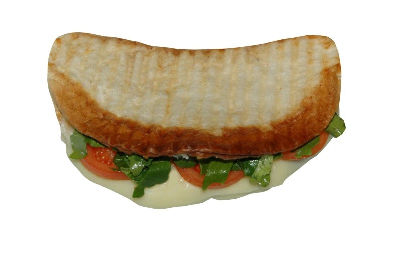 the sandwich is on a plate with cheese and vegetables