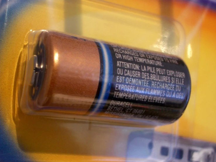 close up of a battery on display in a store window