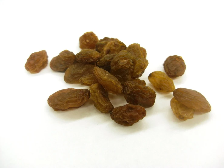 a pile of nuts is on a white background