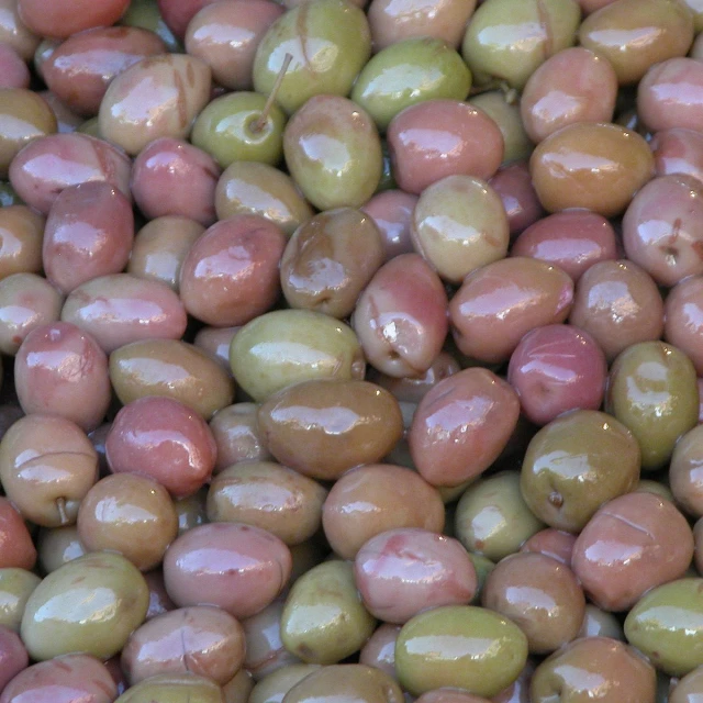 a pile of olives that have been cleaned and sealed