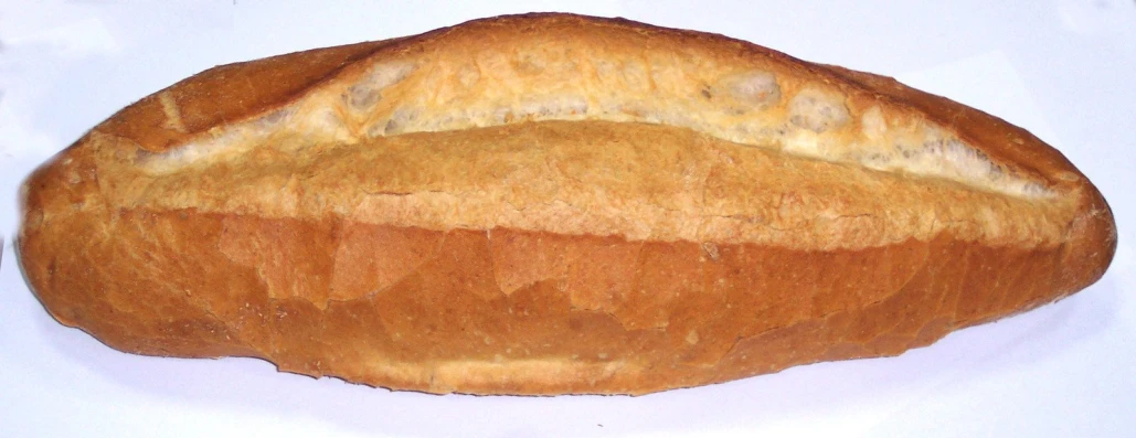 a large piece of bread laying on top of a table