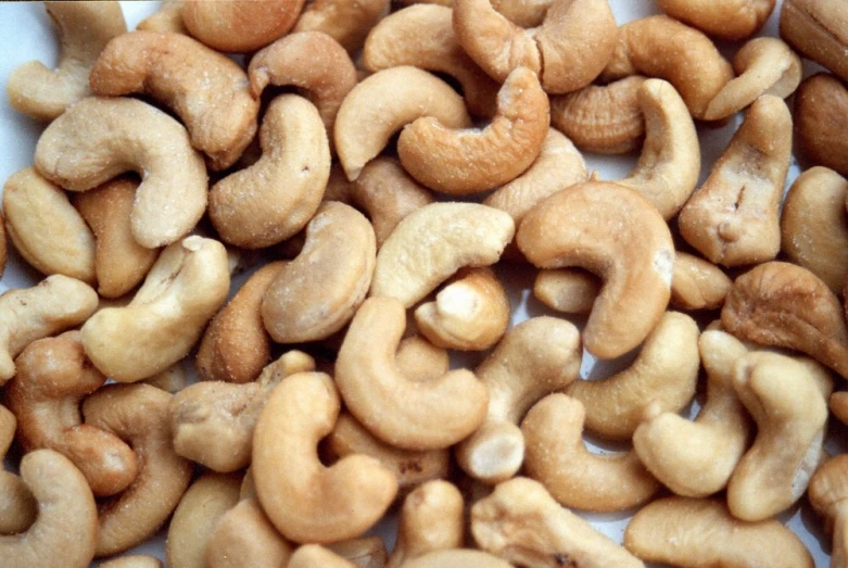 there are many small cashews stacked together