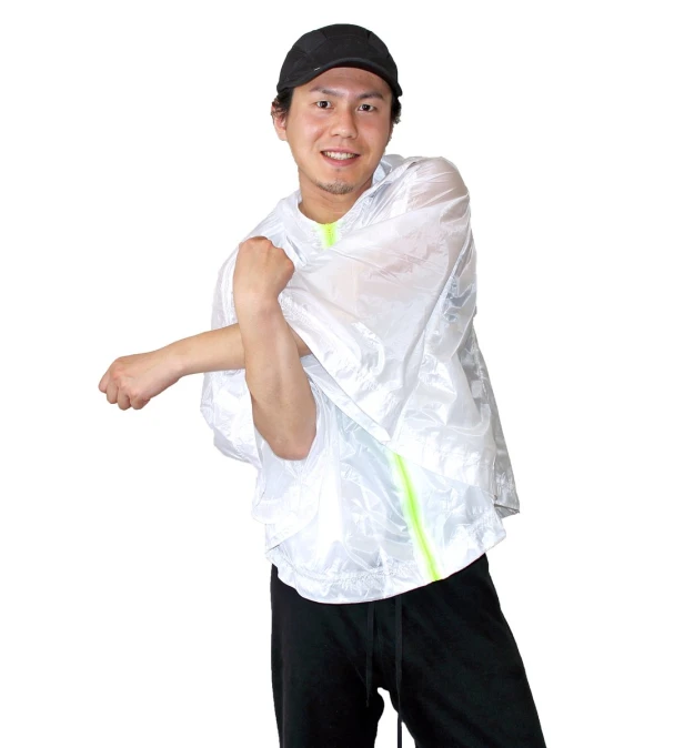 a man with a plastic bag wrapped around his shoulders